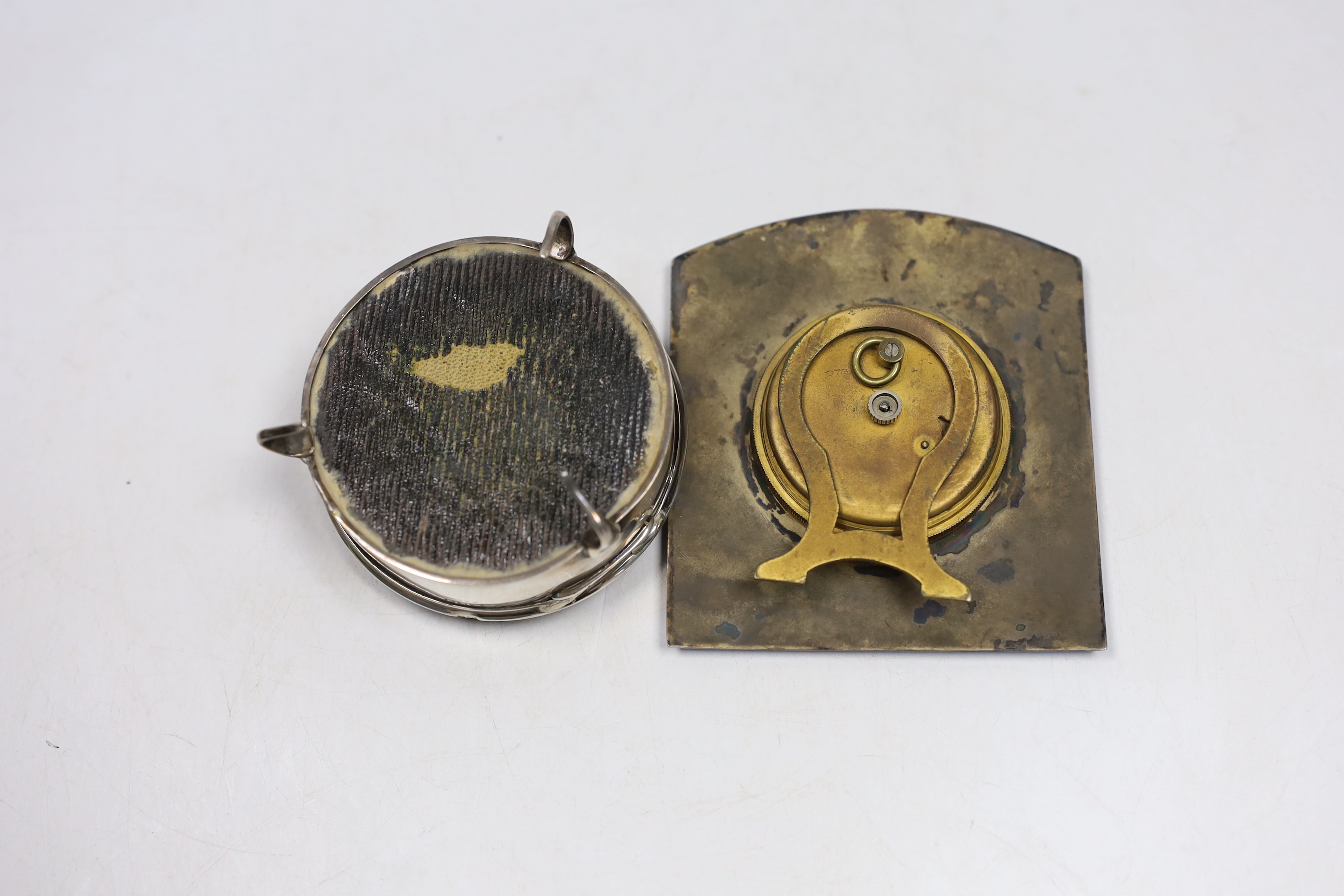 A George V silver and tortoiseshell pique mounted trinket box, by William Comyns, London, 1913, 79mm and an enamelled bedside timepiece.